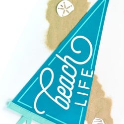 Beach Life Pennant on white background with sand