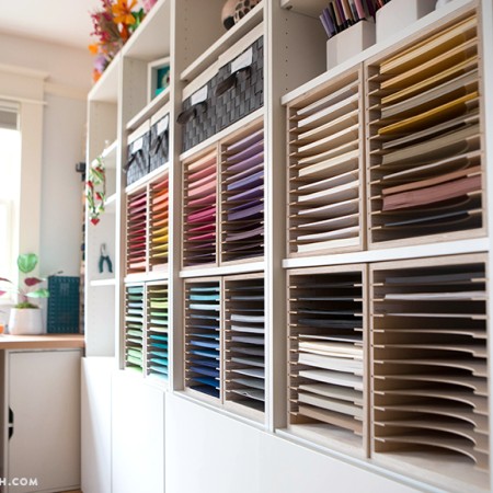 A wall of wooden slots for cardstock storage