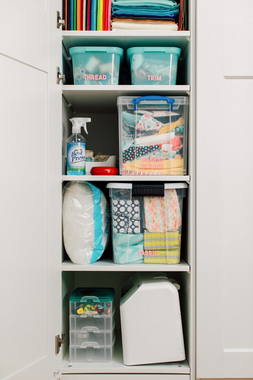 Pax cabinet with sewing machine and bins of sewing supplies