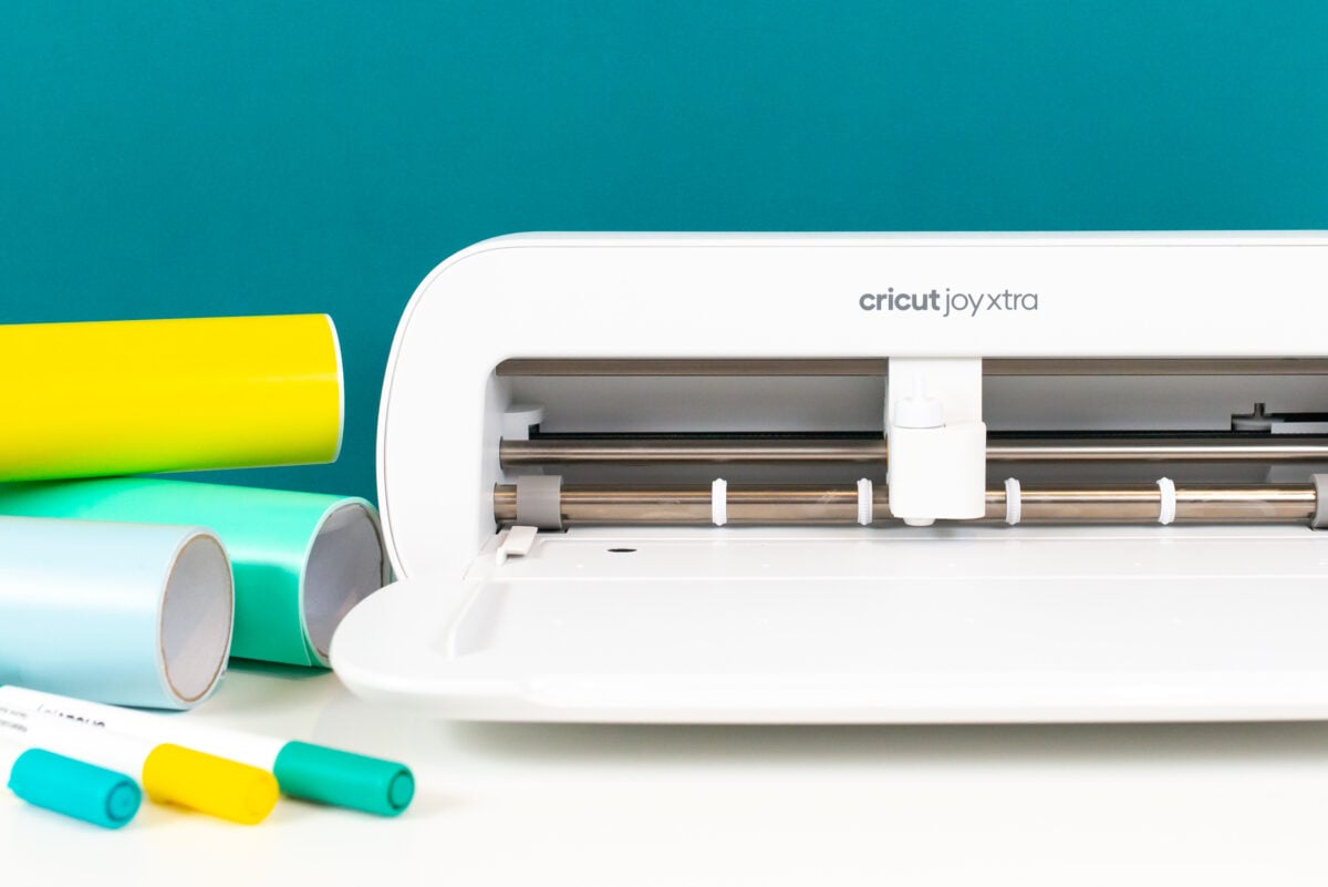 Cricut Joy Xtra with supplies and materials