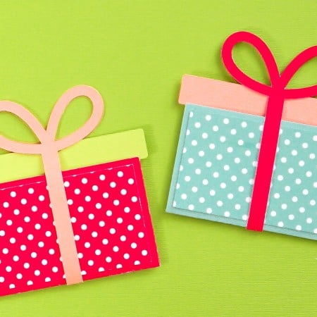 Finished gift card holders on a green background