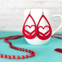 Use your Cricut to make these trendy these faux suede earrings—sweet hearts that are perfect for Valentine's Day. An easy Valentine's Day jewelry project.