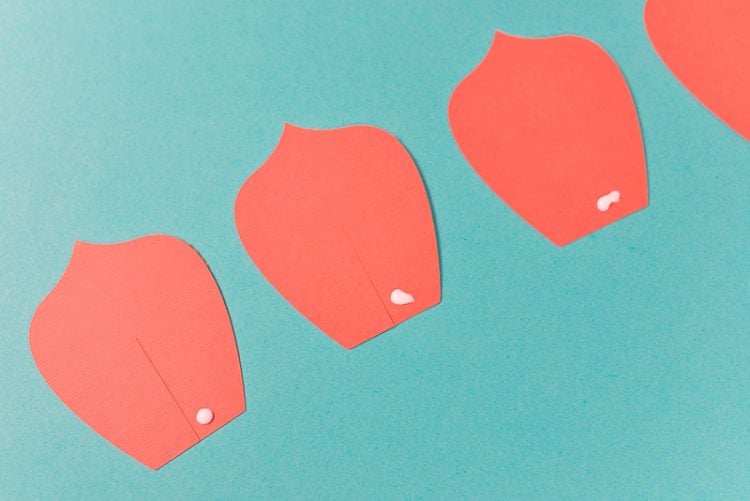 Dot of glue on each piece