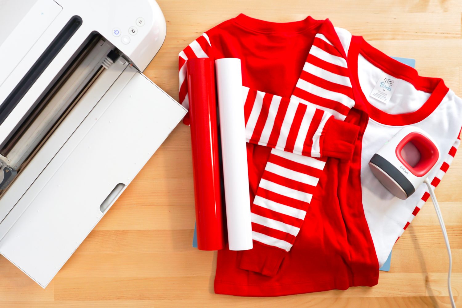 Supplies to make this project: Cricut, blank pajamas, iron on vinyl, and Cricut EasyPress Mini