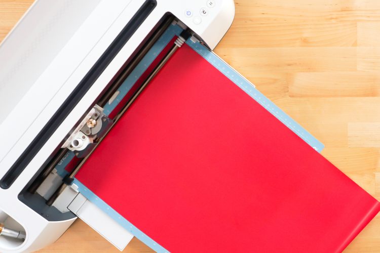 Cricut cutting red iron on