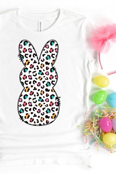 Cheetah-Print Peep Sublimation file on a white kids tee with easter decorations