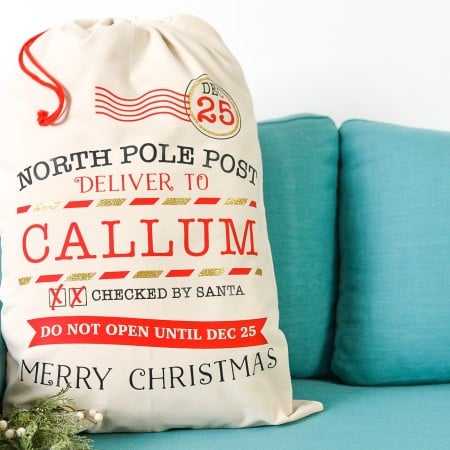 Final Christmas Santa Sack on Blue Couch