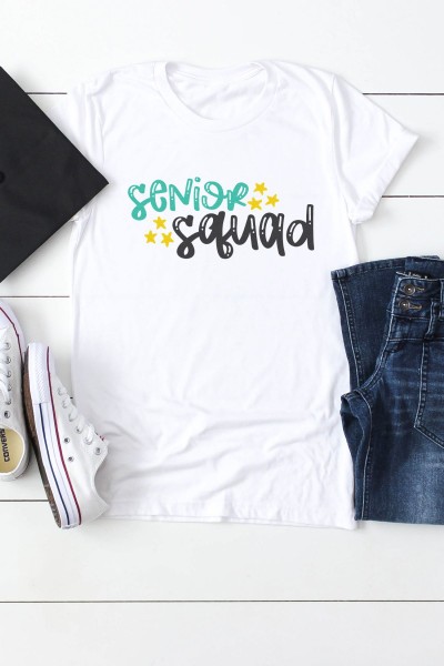Graduation cap, blue jeans, white tennis shoes and a white t-shirt that says Senior Squad in black and aqua lettering