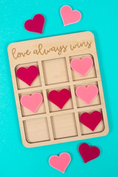 Valentine's Day Tic Tac Toe game on blue background